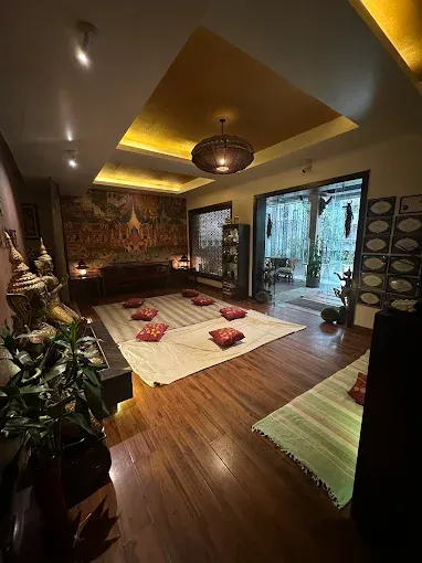 Traditional Thai lounge with cushioned floor seating at Just Relax Thai Spa